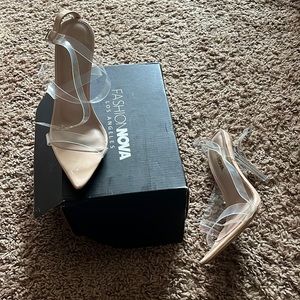 Fashion Nova stiletto heels. Straps are plastic like straps. Women’s heels